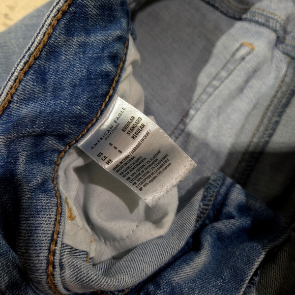 American Eagle| Women's Distressed Blue Jegging Jeans - Picture 8 of 12
